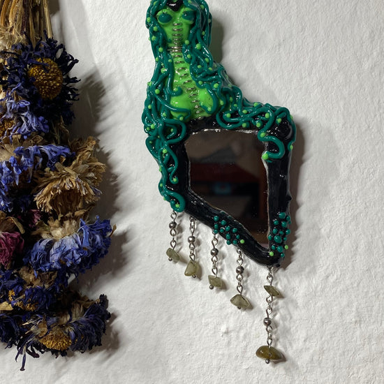 video of different angles and details of alien siren mirror