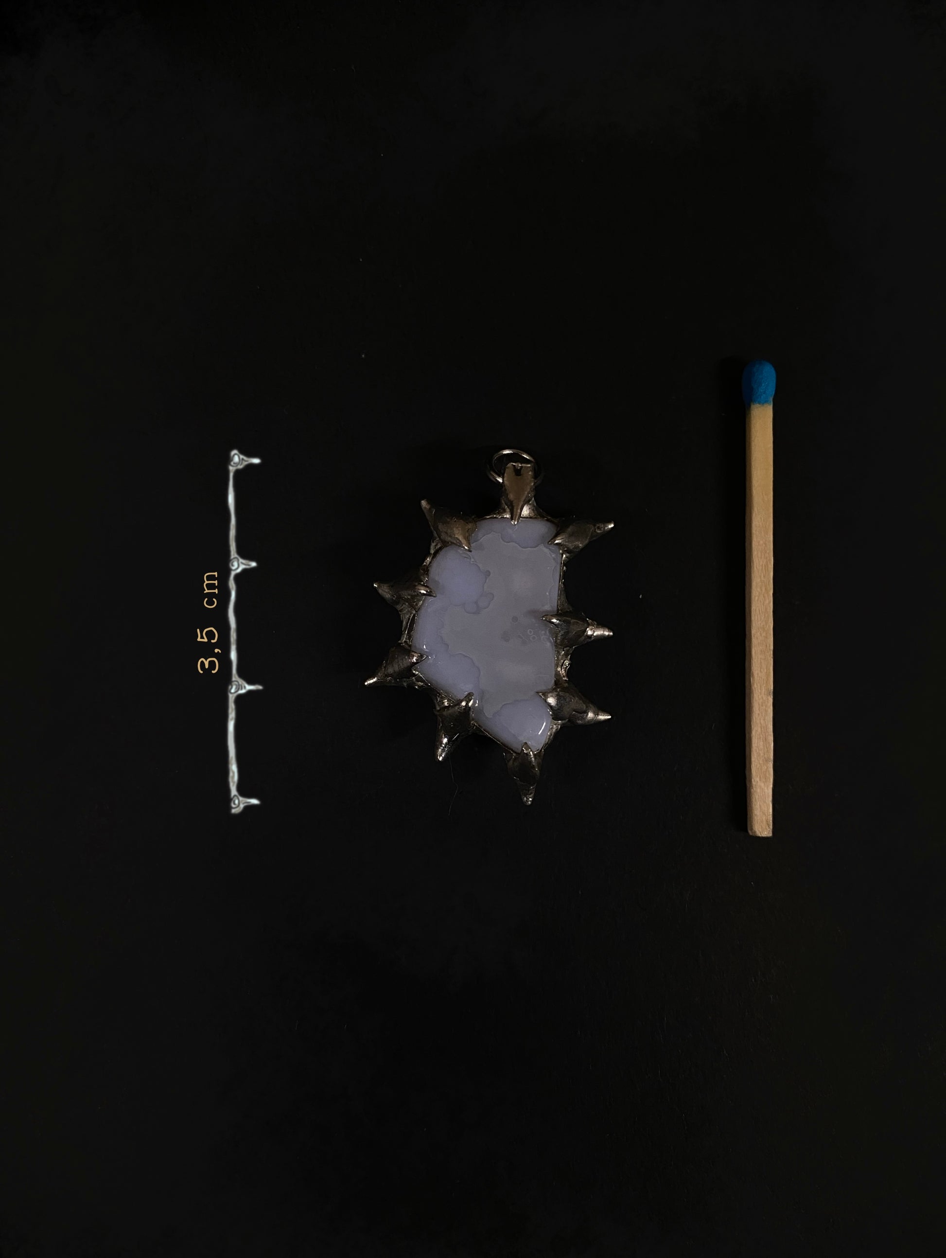 Handmade spiky Blue Chalcedony pendant with size reference (3.5 cm), shown next to a matchstick, fair trade gemstone, silver setting